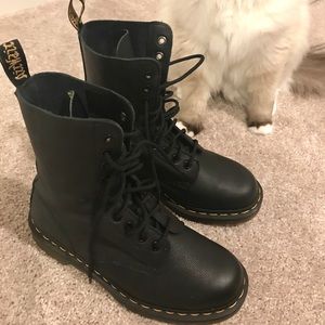Dr. Martens lace up boots in black leather